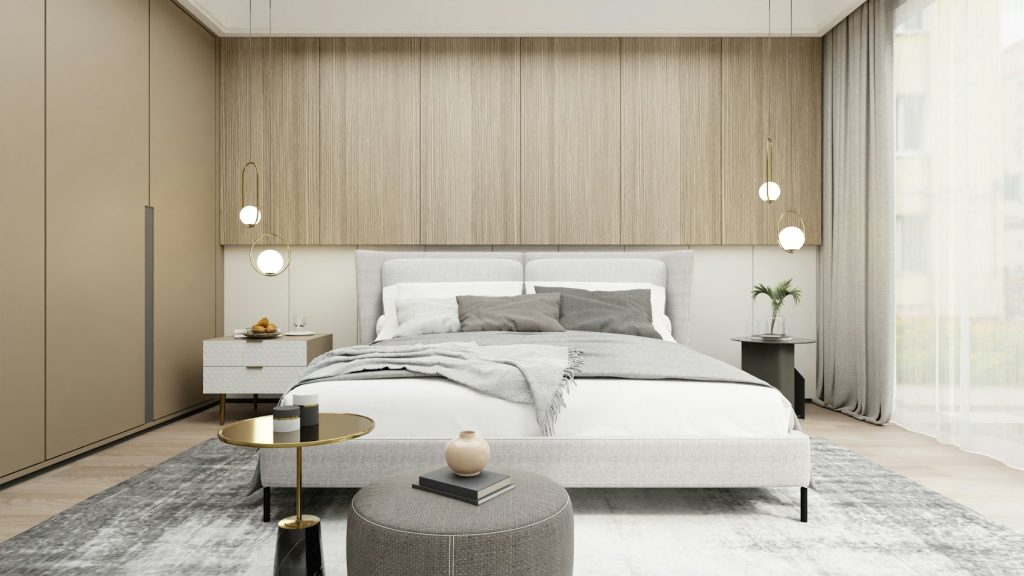 Chambre avec grand lit face à la fenêtre - photo d'illustration, programmes Bouygues Immobilier